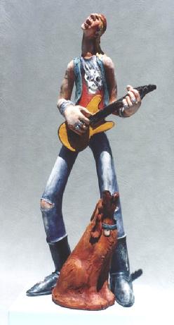 Ceramic sculpture of Guitarist and Dog