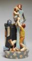 ceramic sculpture of working mother