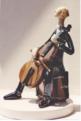 Cello Player ceramic sculpture
